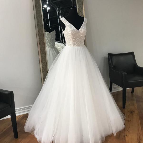 white gown with pearls